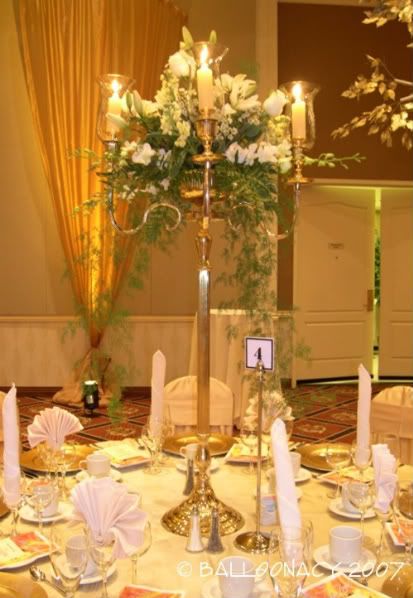 The centerpieces will be provided by the reception venue for free