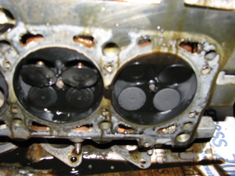 what causes a headgasket to blow between cylinders?