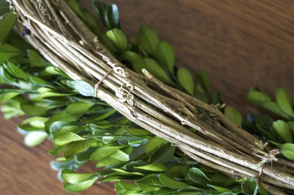 I have wanted a boxwood wreath for a long time. The price tag, not so much, Luckily I found an amazing deal on one, the only problem the shape.  See how I fixed that! 